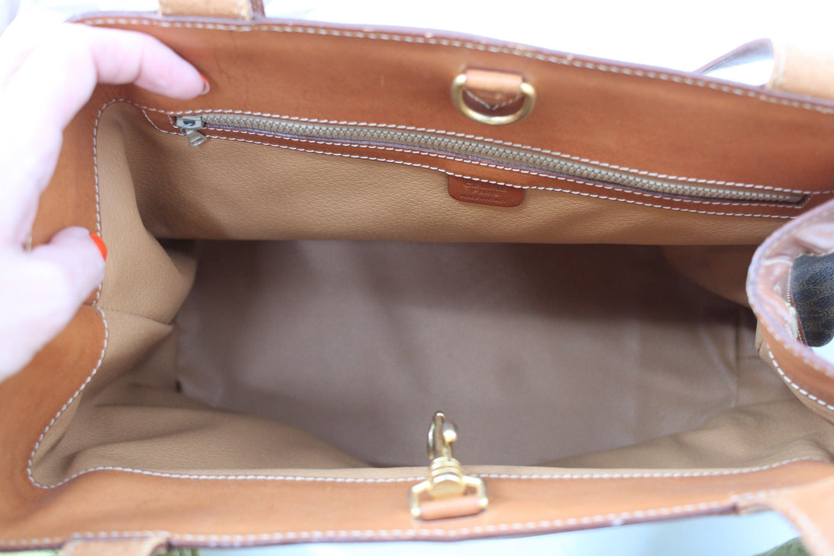 interior lining with zip pocket and made in italy tab
