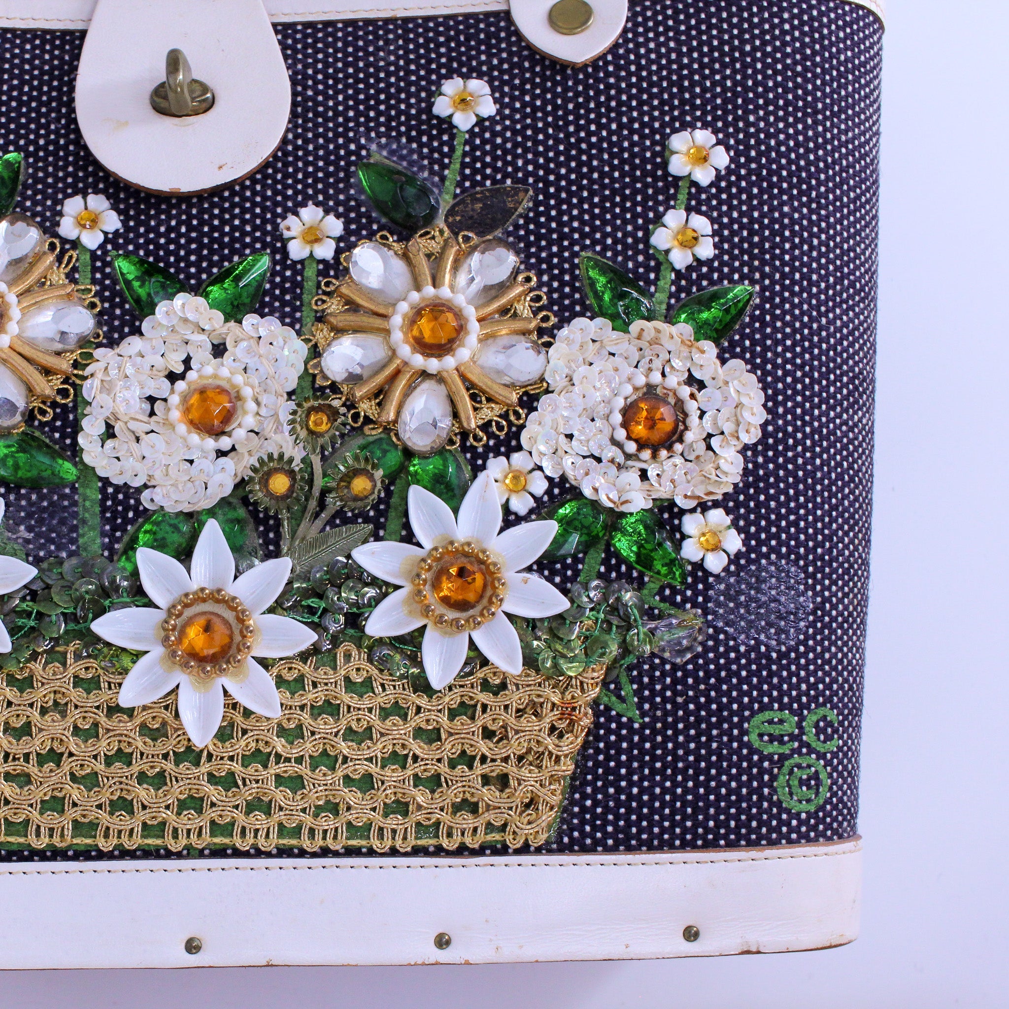 jeweled flower detail showing missing stones