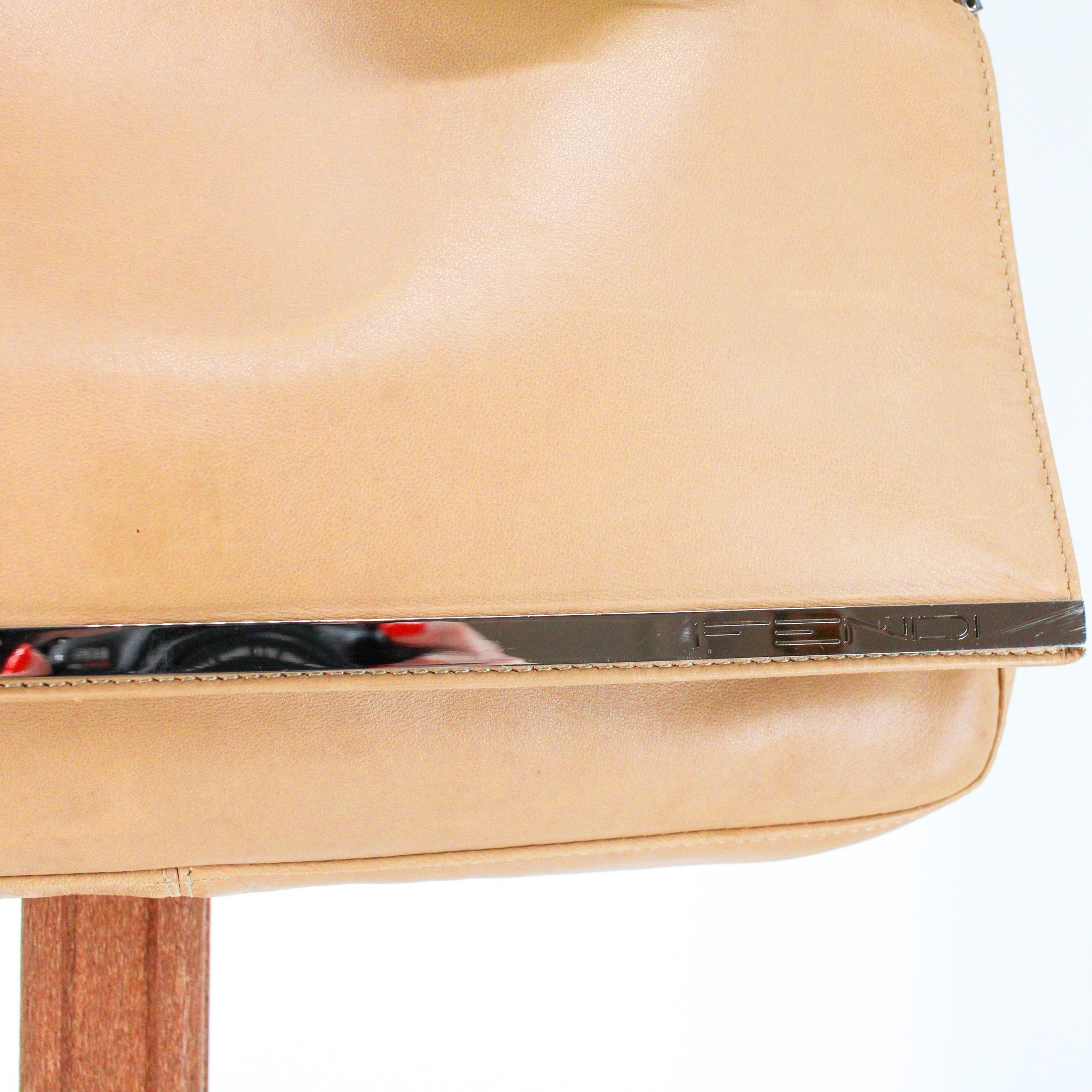 metal logo bar and flap detail