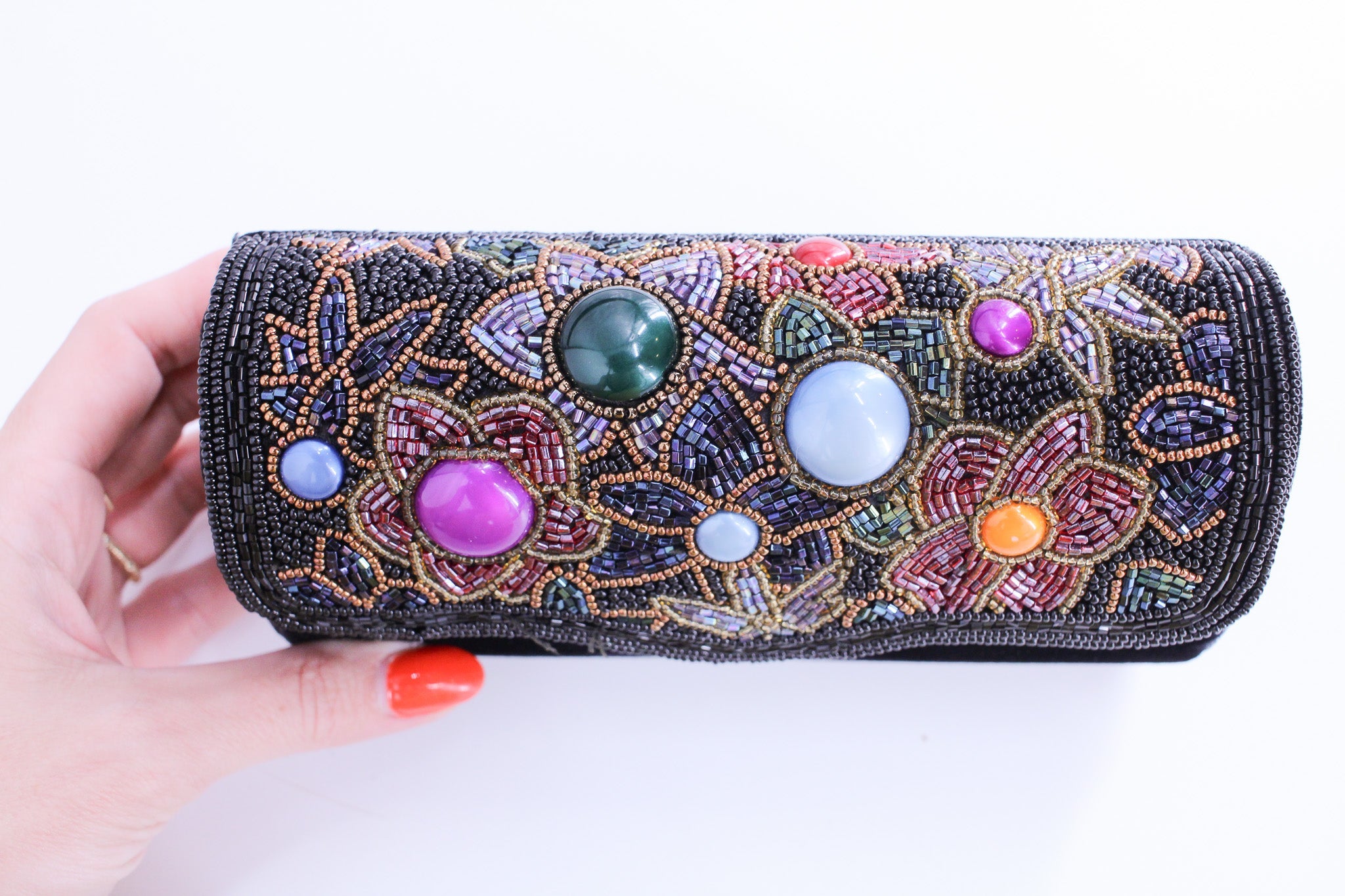 hand-beaded floral flap with glass cabochons