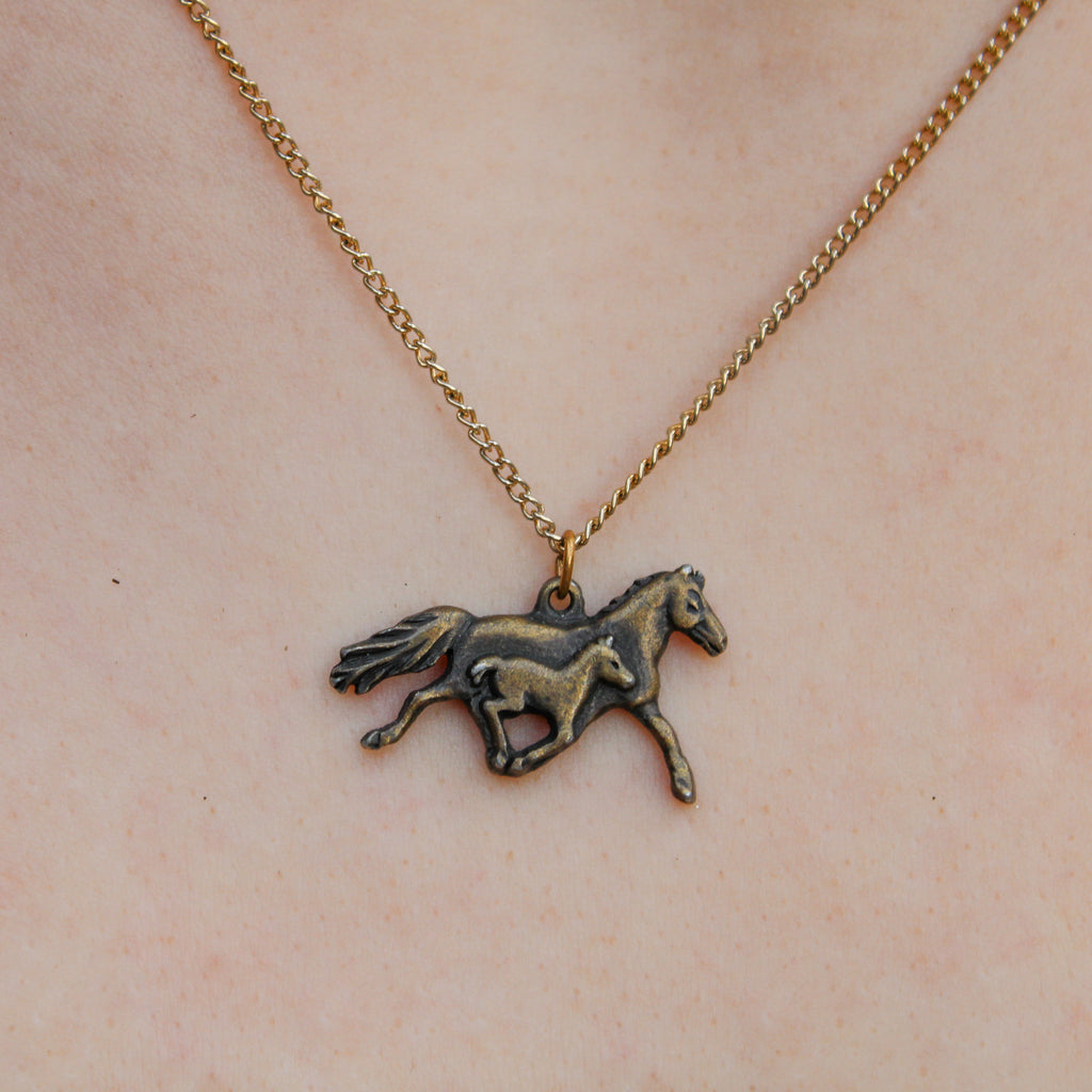 90s running horse and foal pendant necklace in brass tone