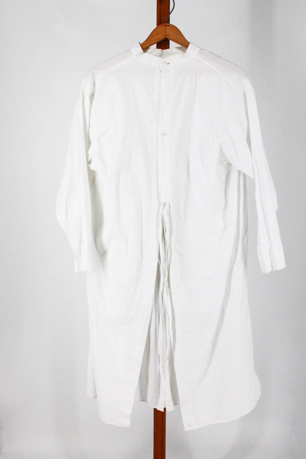 full front showing bib placket and ties