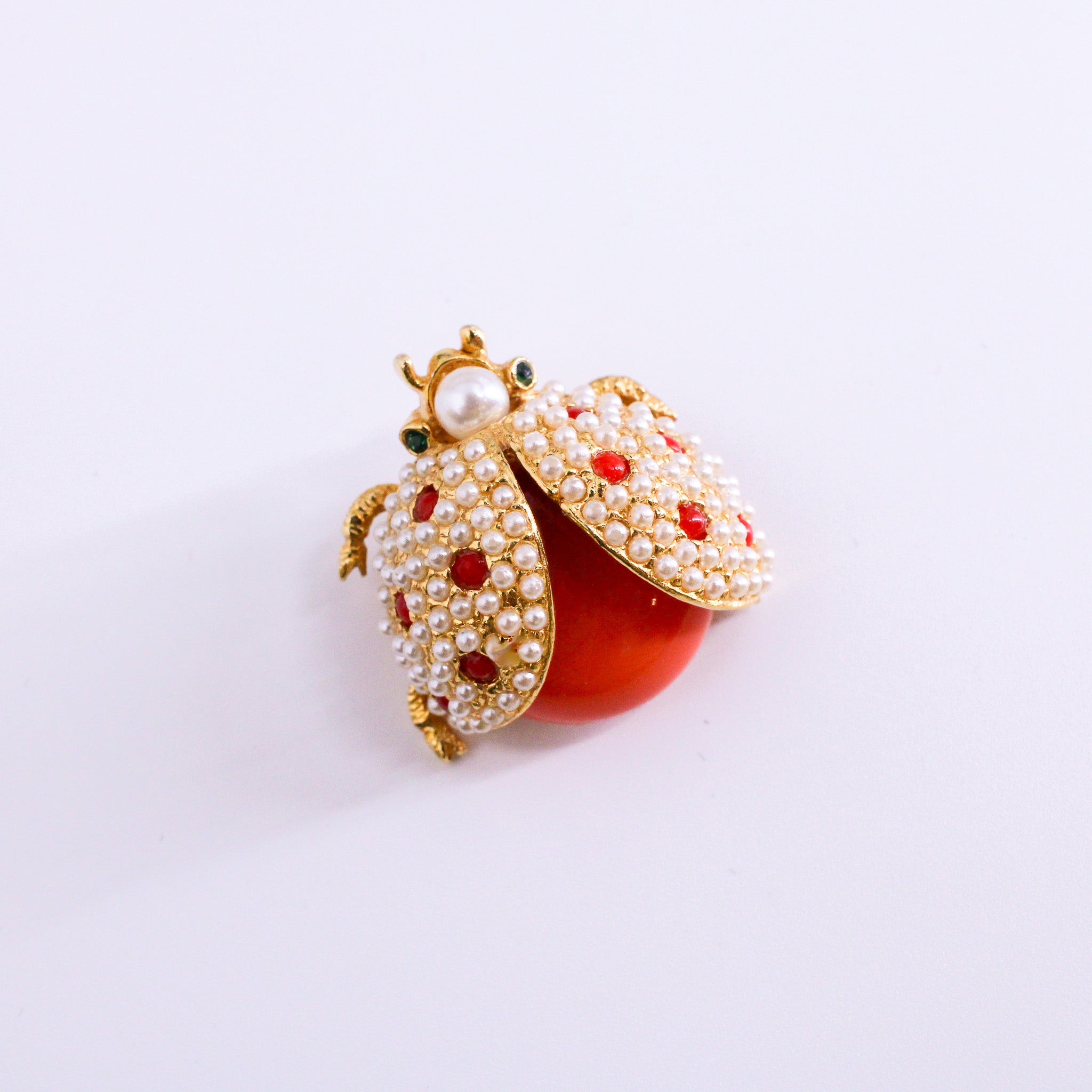 hattie carnegie ladybug brooch, angled