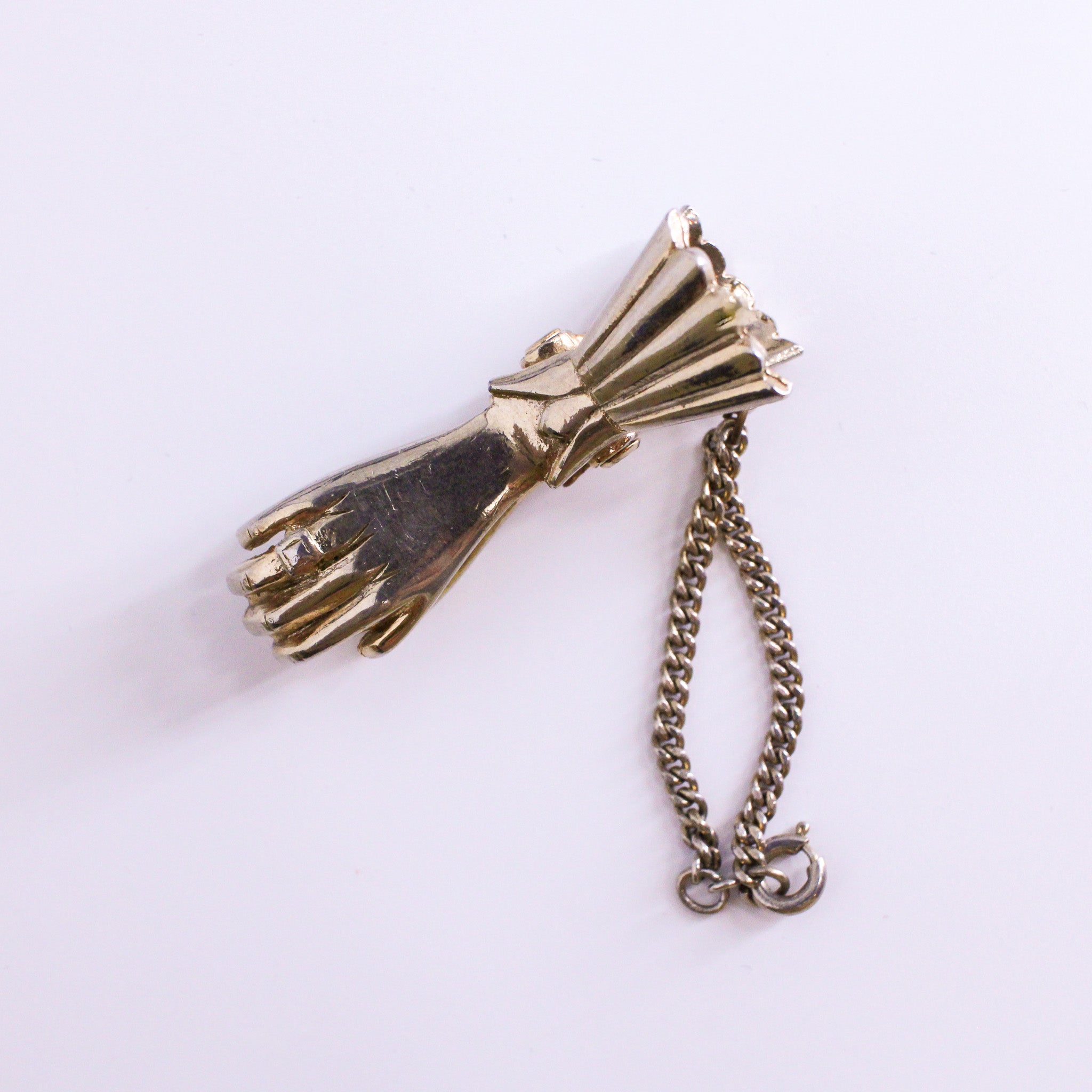 figural hand sweater clip, detail