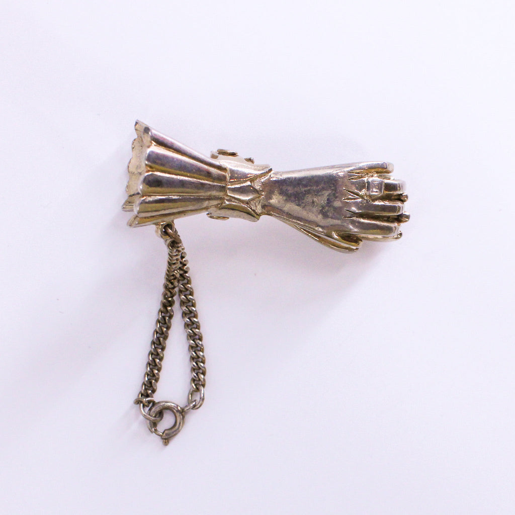 figural hand sweater clip, detail
