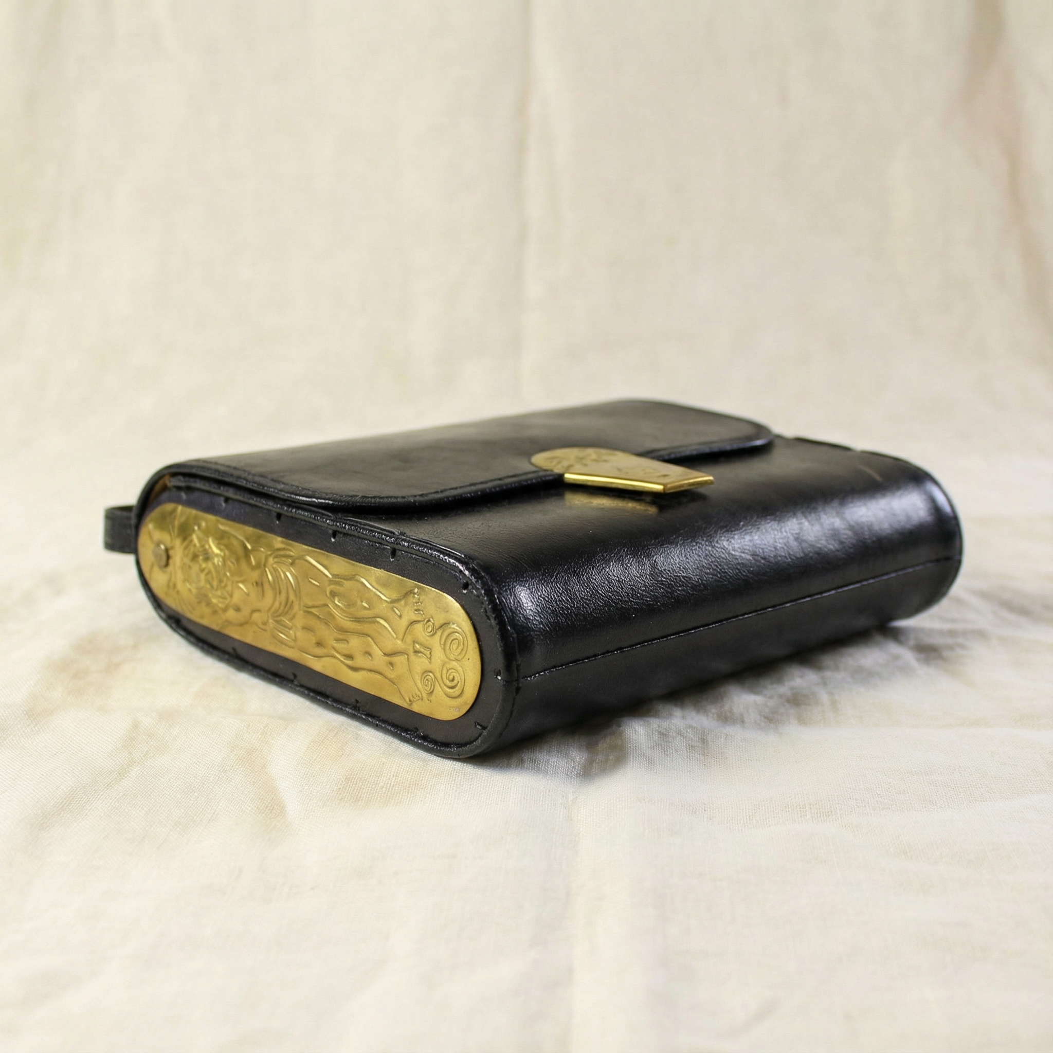 80s surrealist brass relief purse - studio metalwork