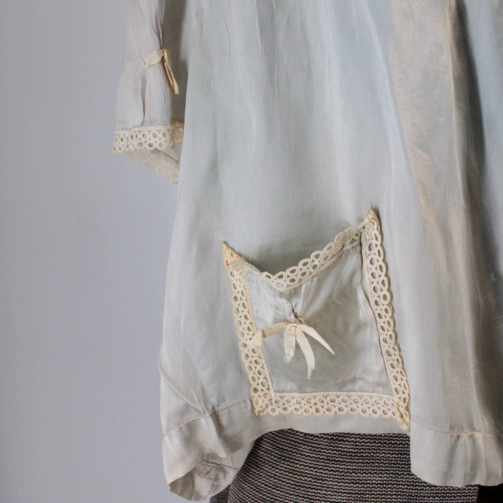 lace pocket with ribbon bow detail