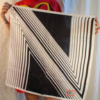 vintage norman norell “n” graphic silk scarf – black & white with red logo