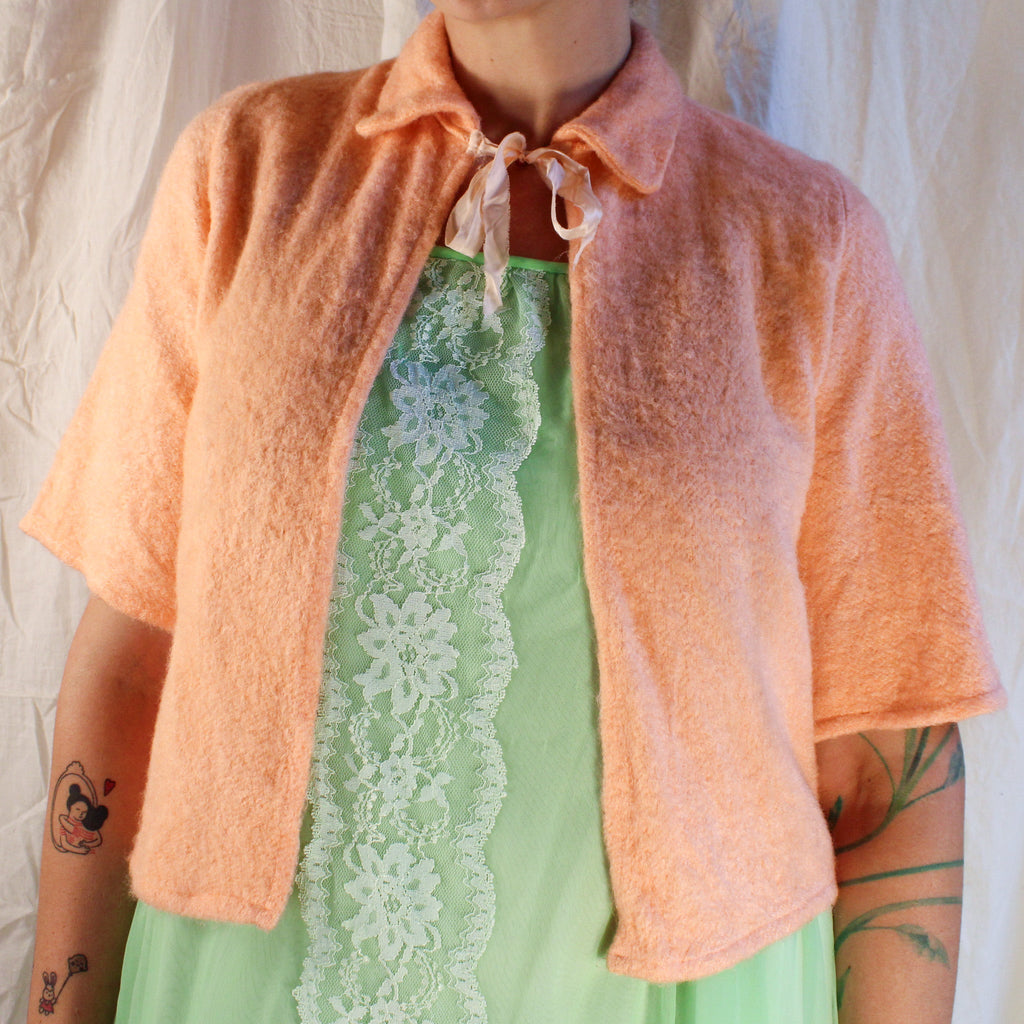 50s/60s peach fuzzy bed jacket with neck ribbon