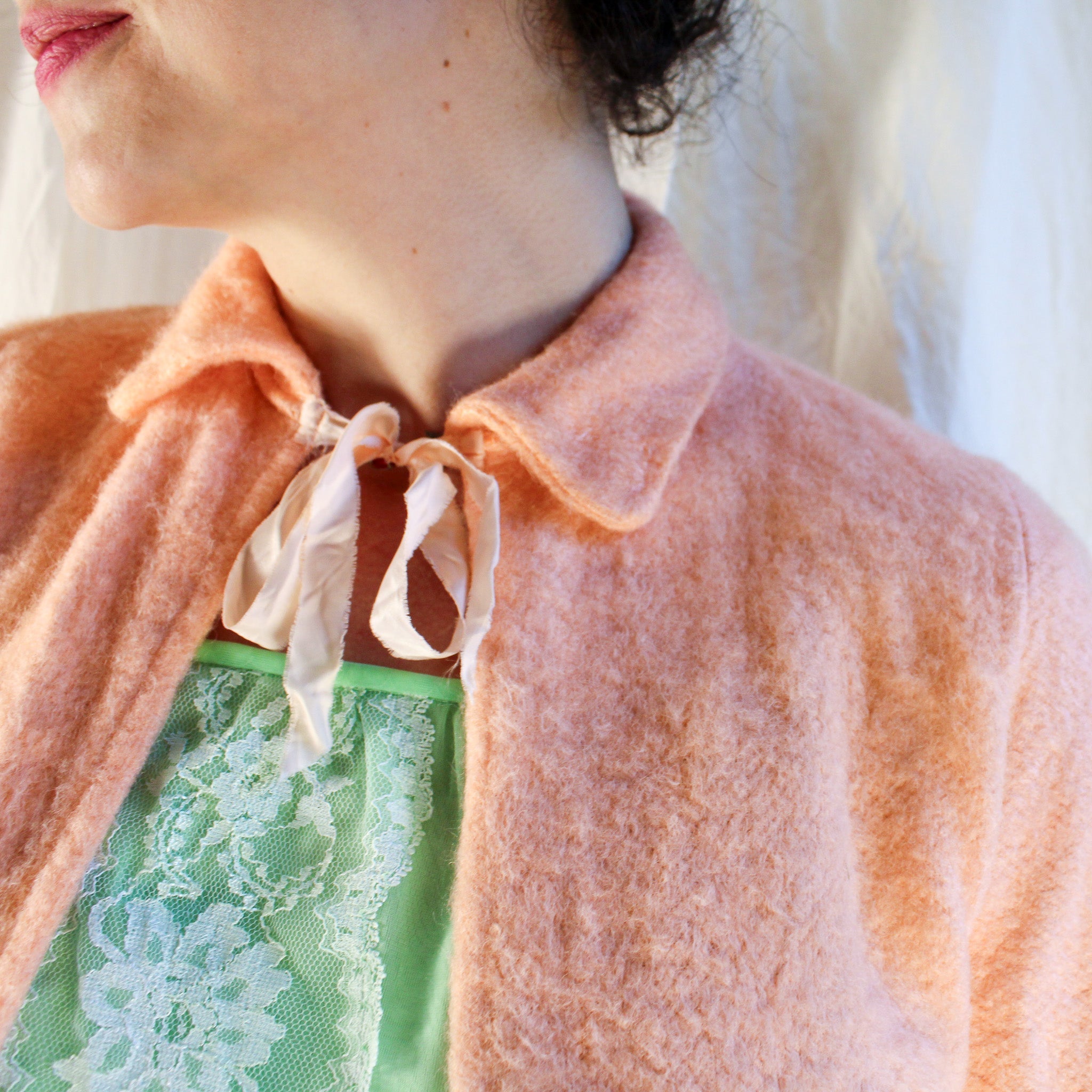 50s/60s peach fuzzy bed jacket with neck ribbon