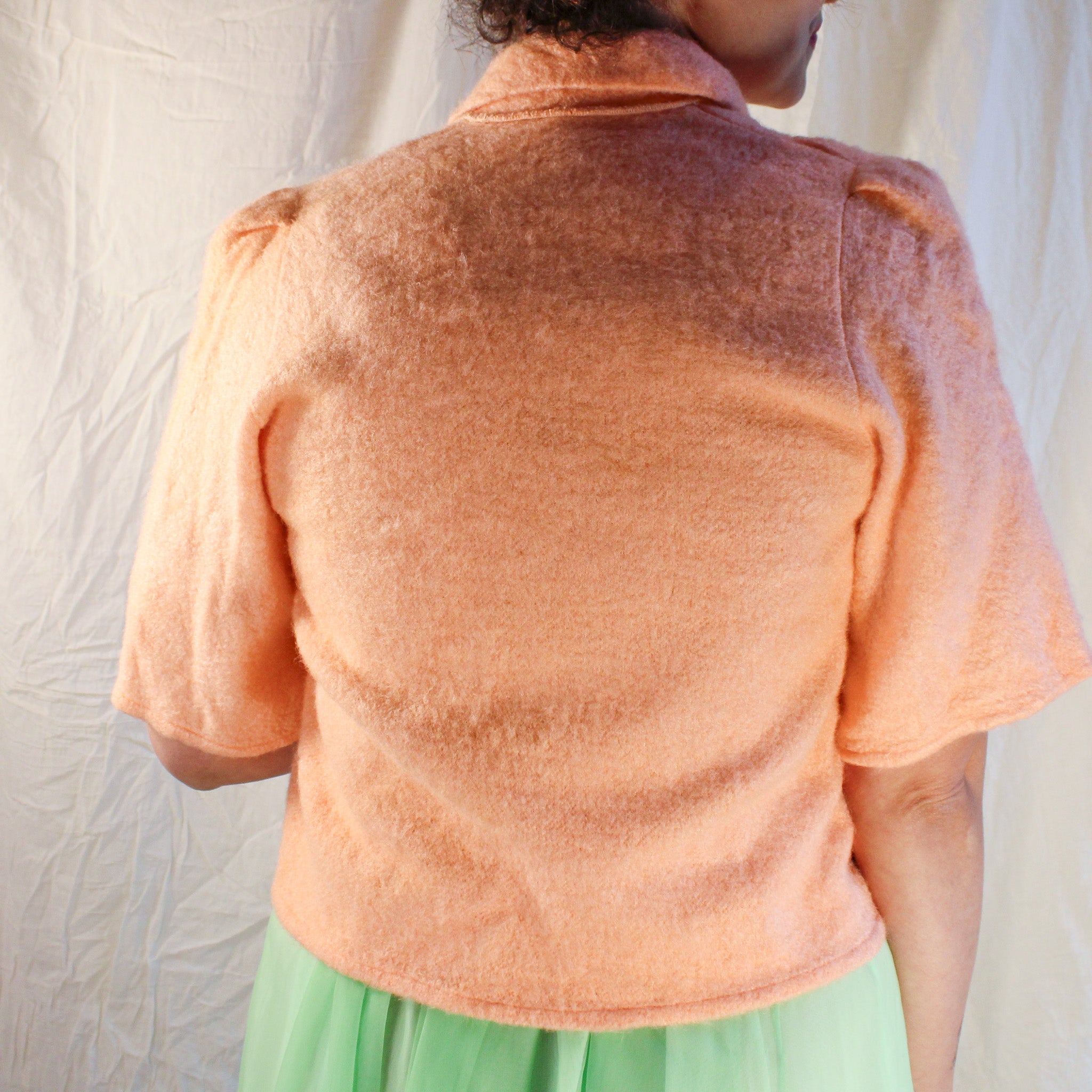50s/60s peach fuzzy bed jacket with neck ribbon