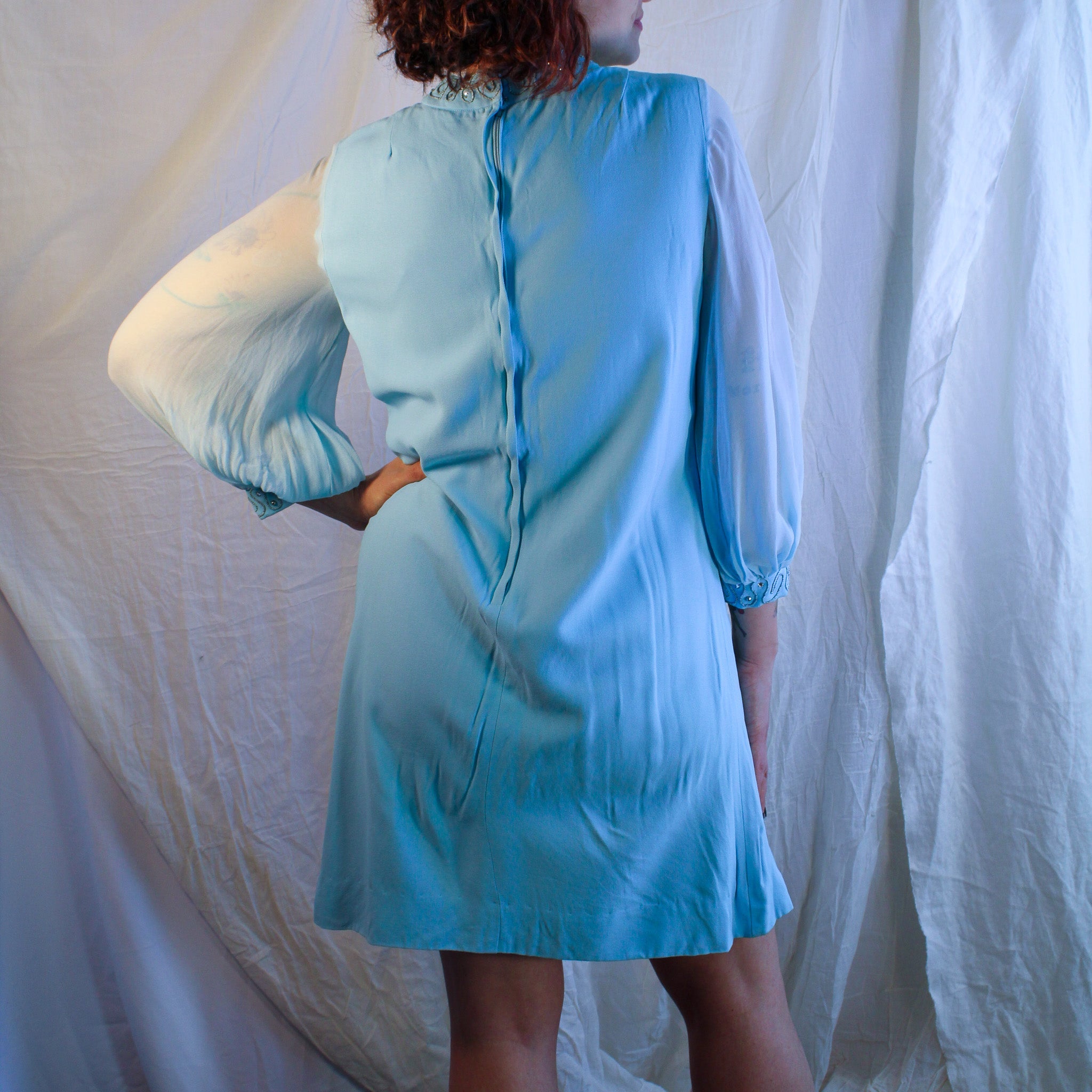 Back view on model showing metal zipper