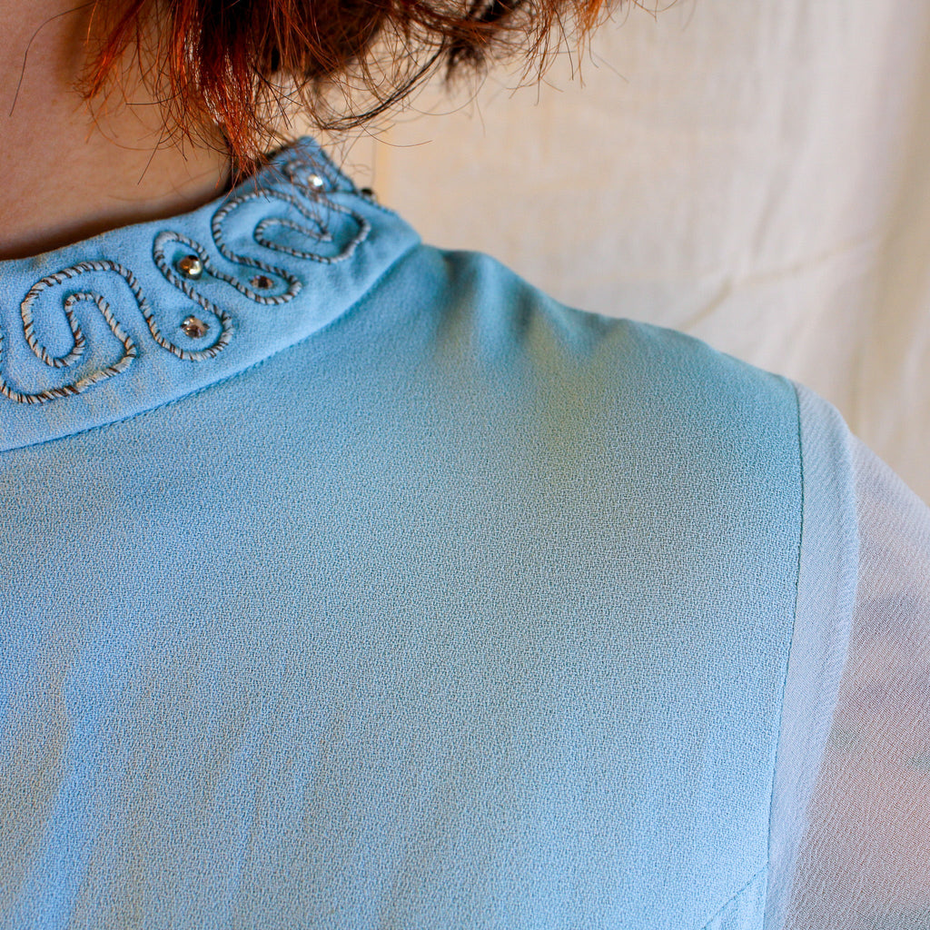 Detail of beaded mock neck