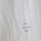 period laundry stamp on the front