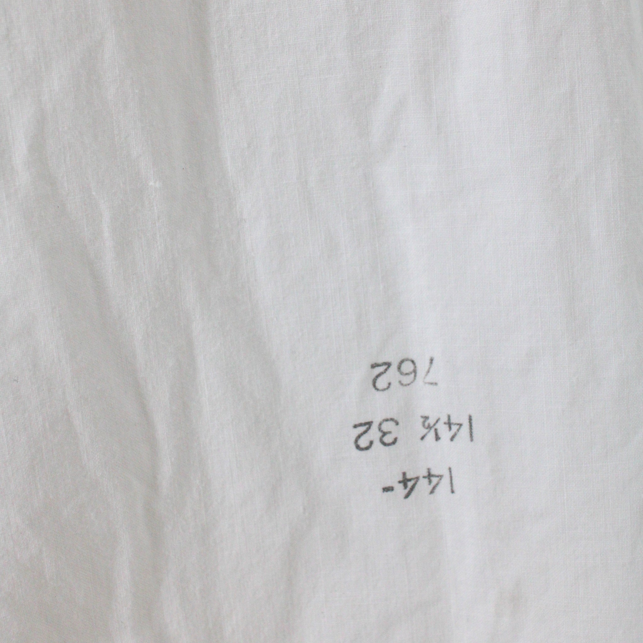 period laundry stamp on the front