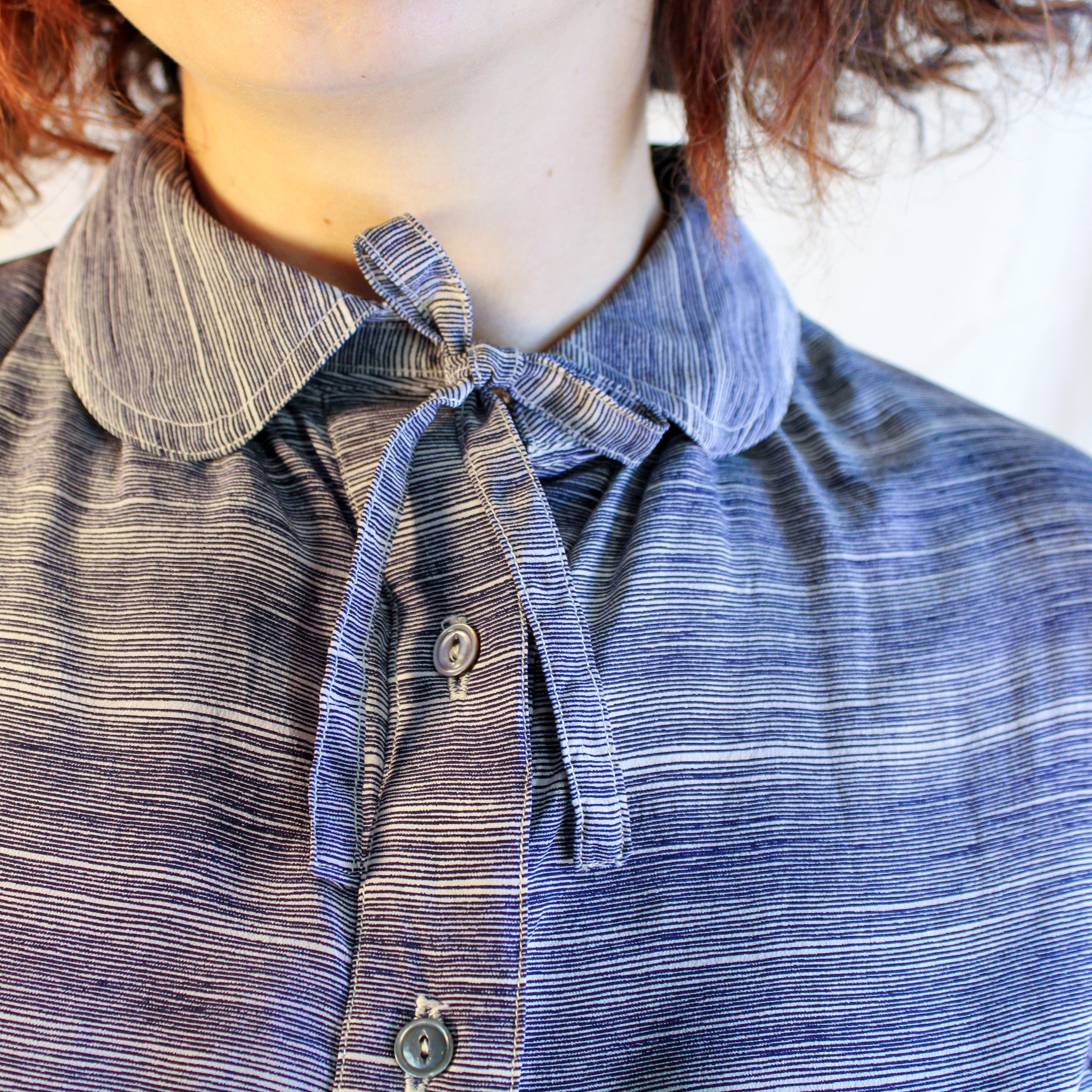 Collar and tie detail