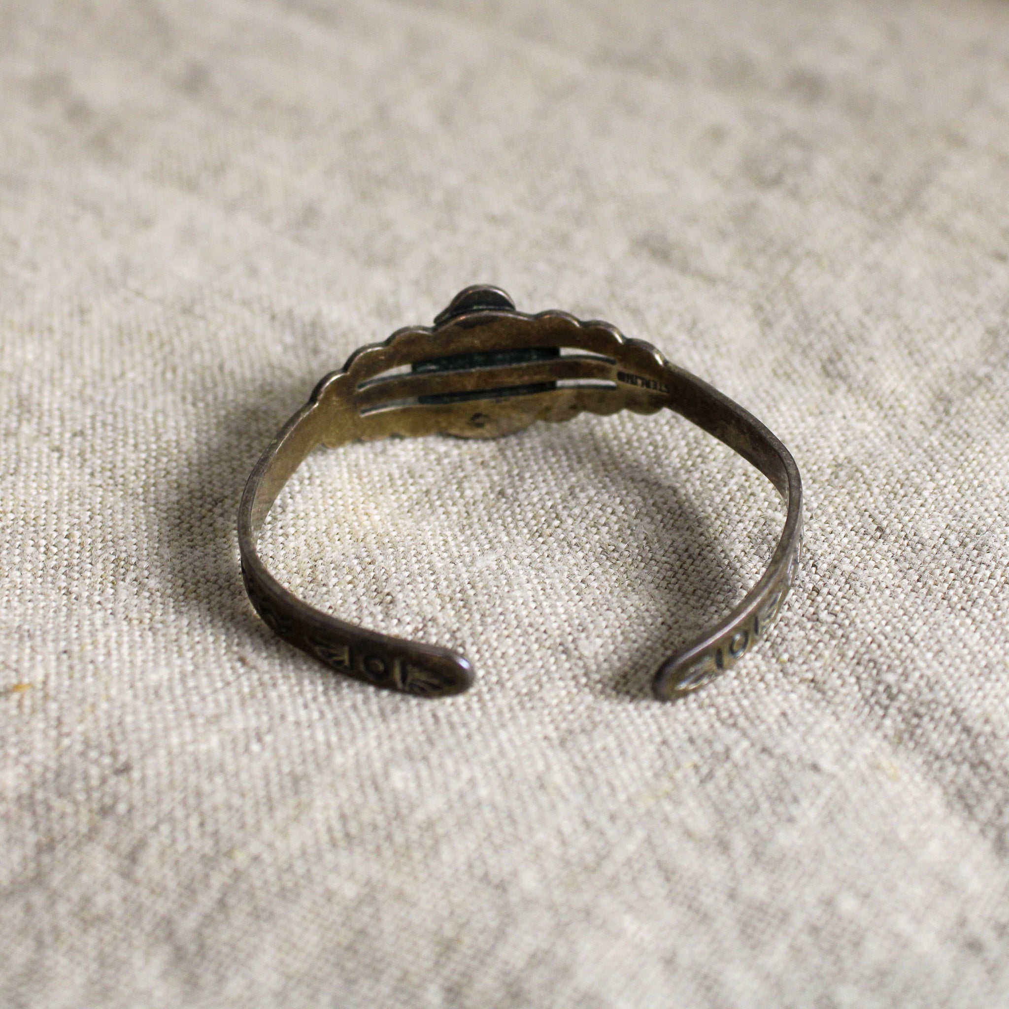 50s sterling baby cuff w/ thunderbird & turquoise glass cabochon