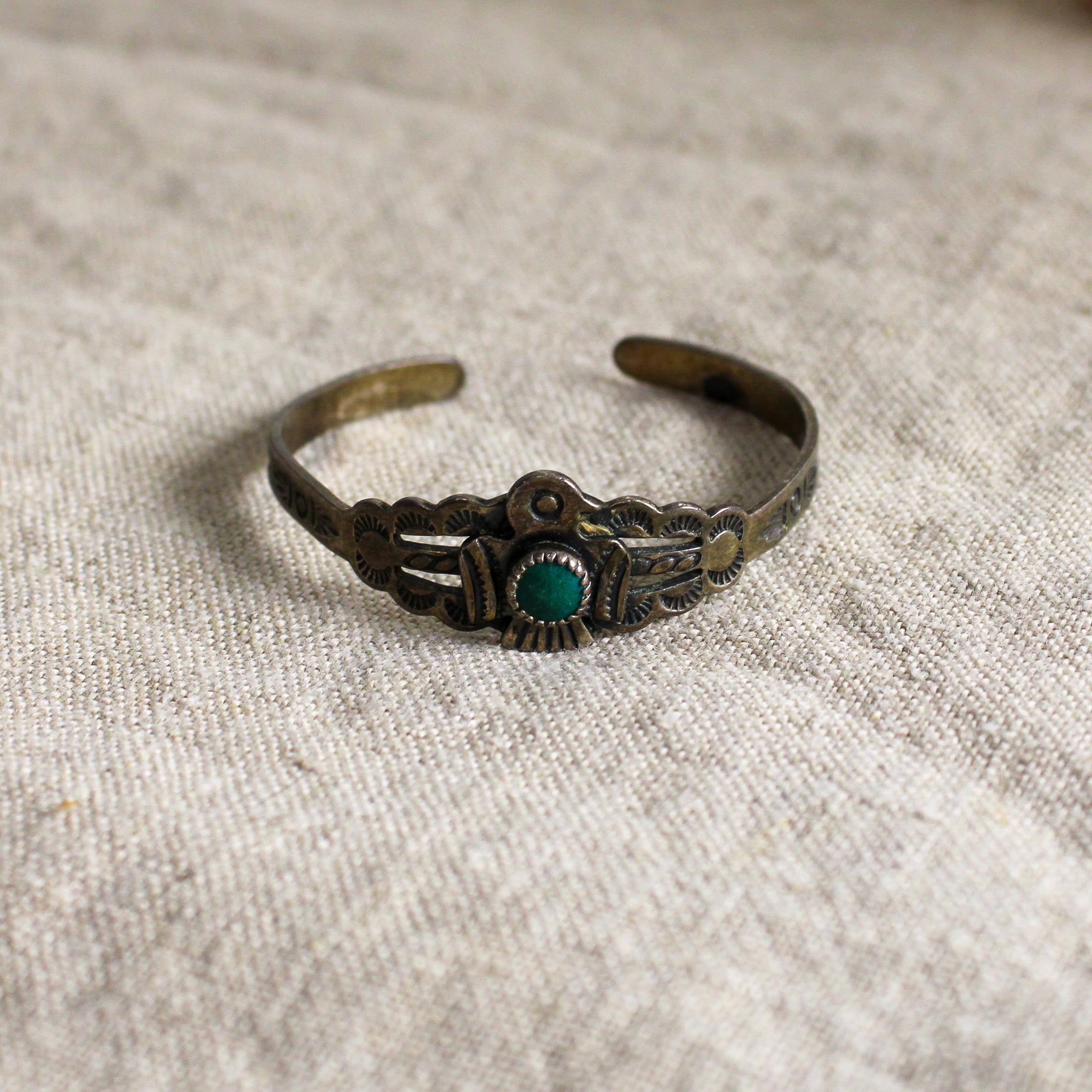 50s sterling baby cuff w/ thunderbird & turquoise glass cabochon