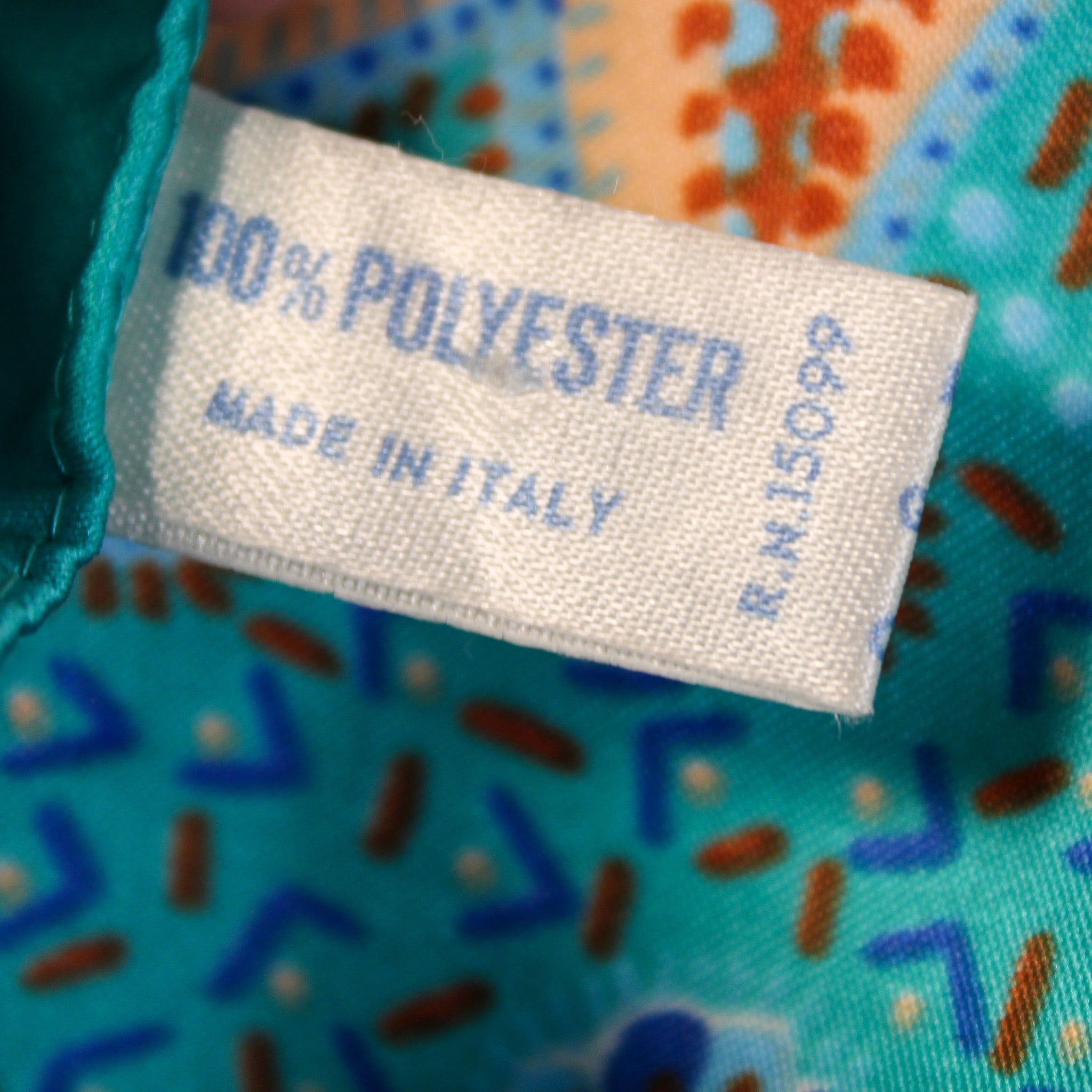 Made in Italy / 100% Polyester tag