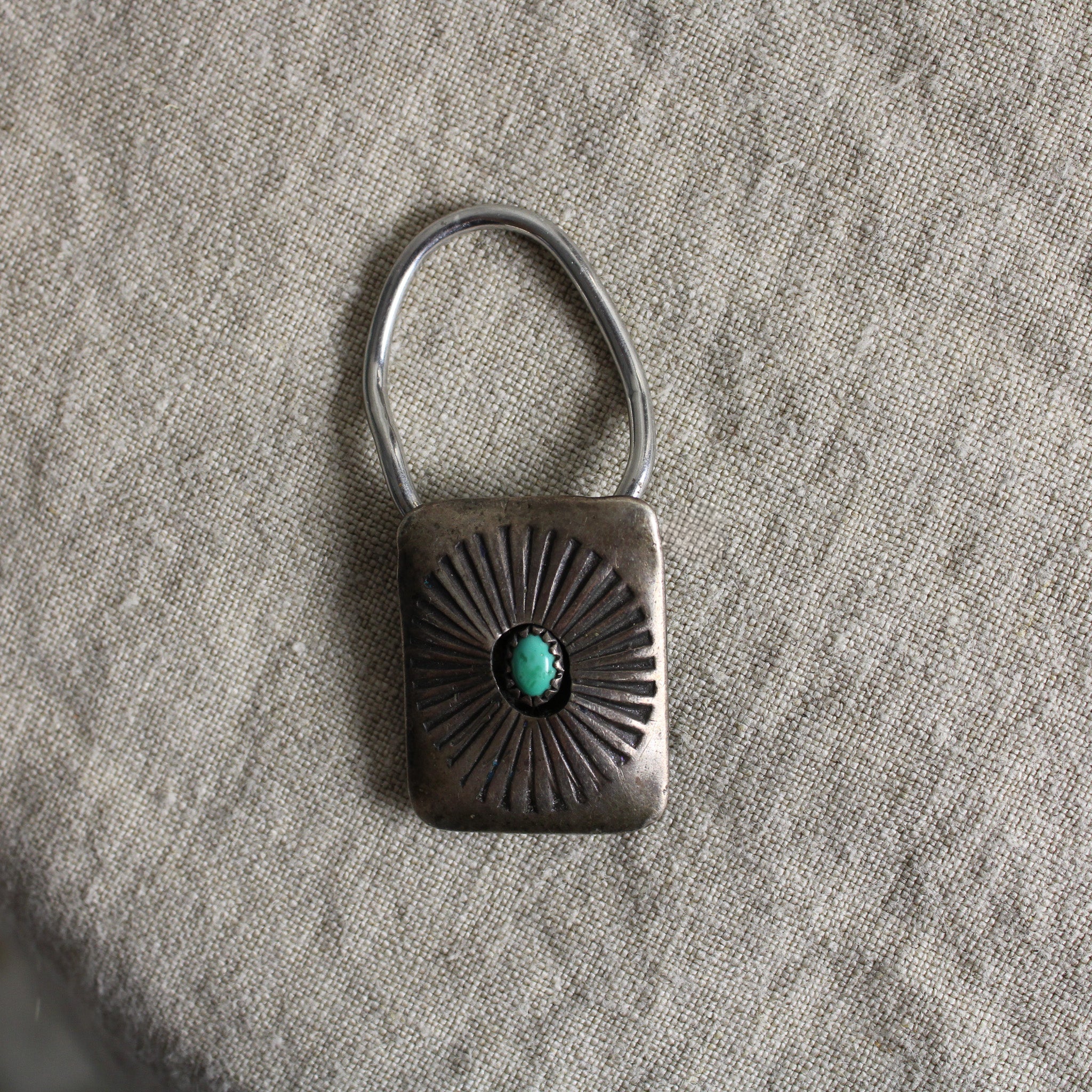mid-century bennett turquoise and silver sunburst bolo tie slide