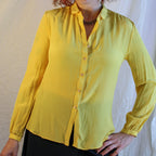 Front view on model of Elizabeth Arden marigold silk blouse (NOS)